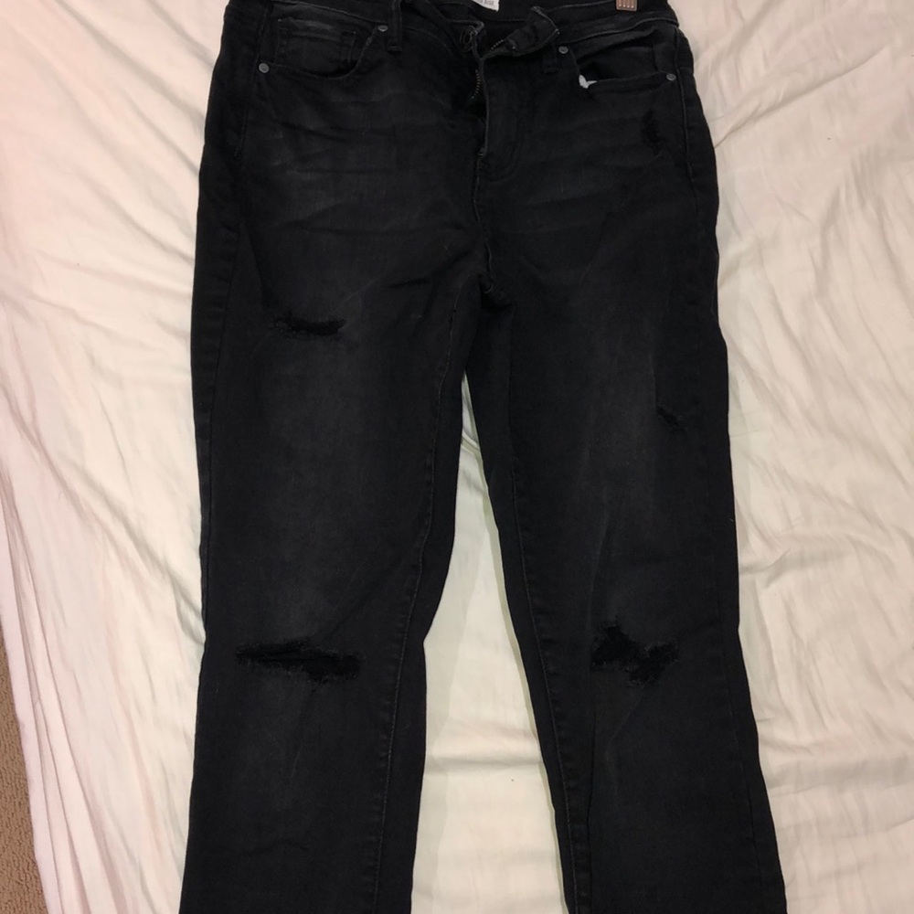 black lightly distressed jeans